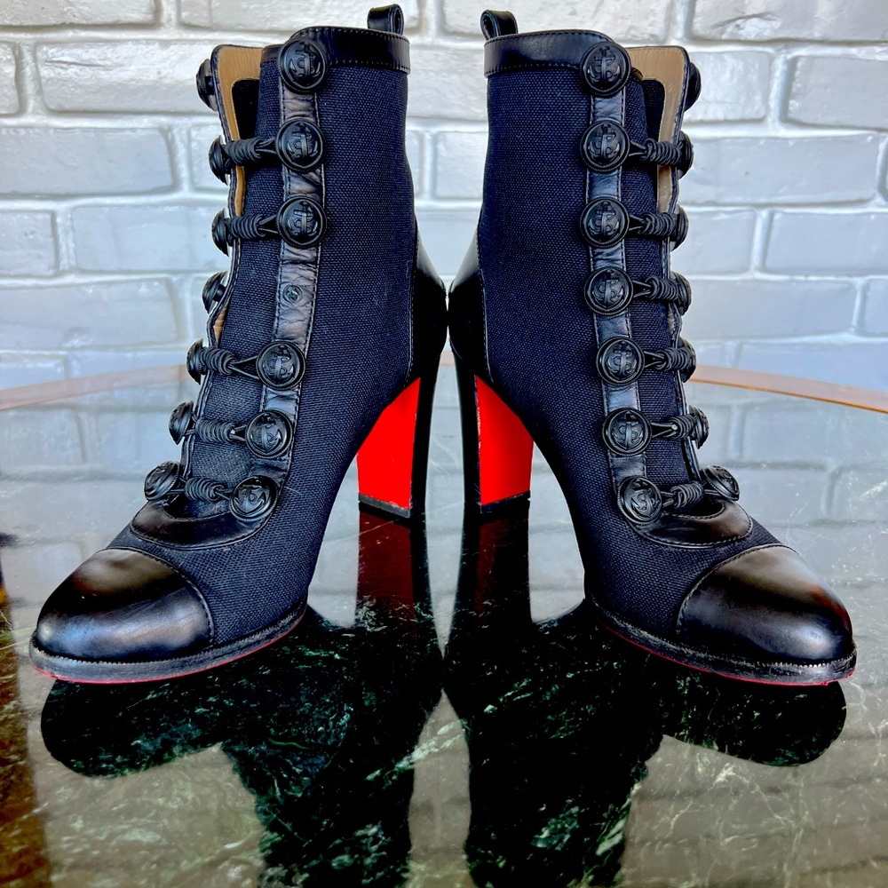 Christian Louboutin Caval Fabric Booties with Anchor Toggles up front of booties